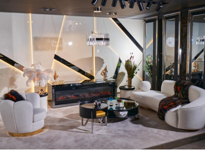 Luxurious white living room set with 3-seater, armchair, round coffee table.